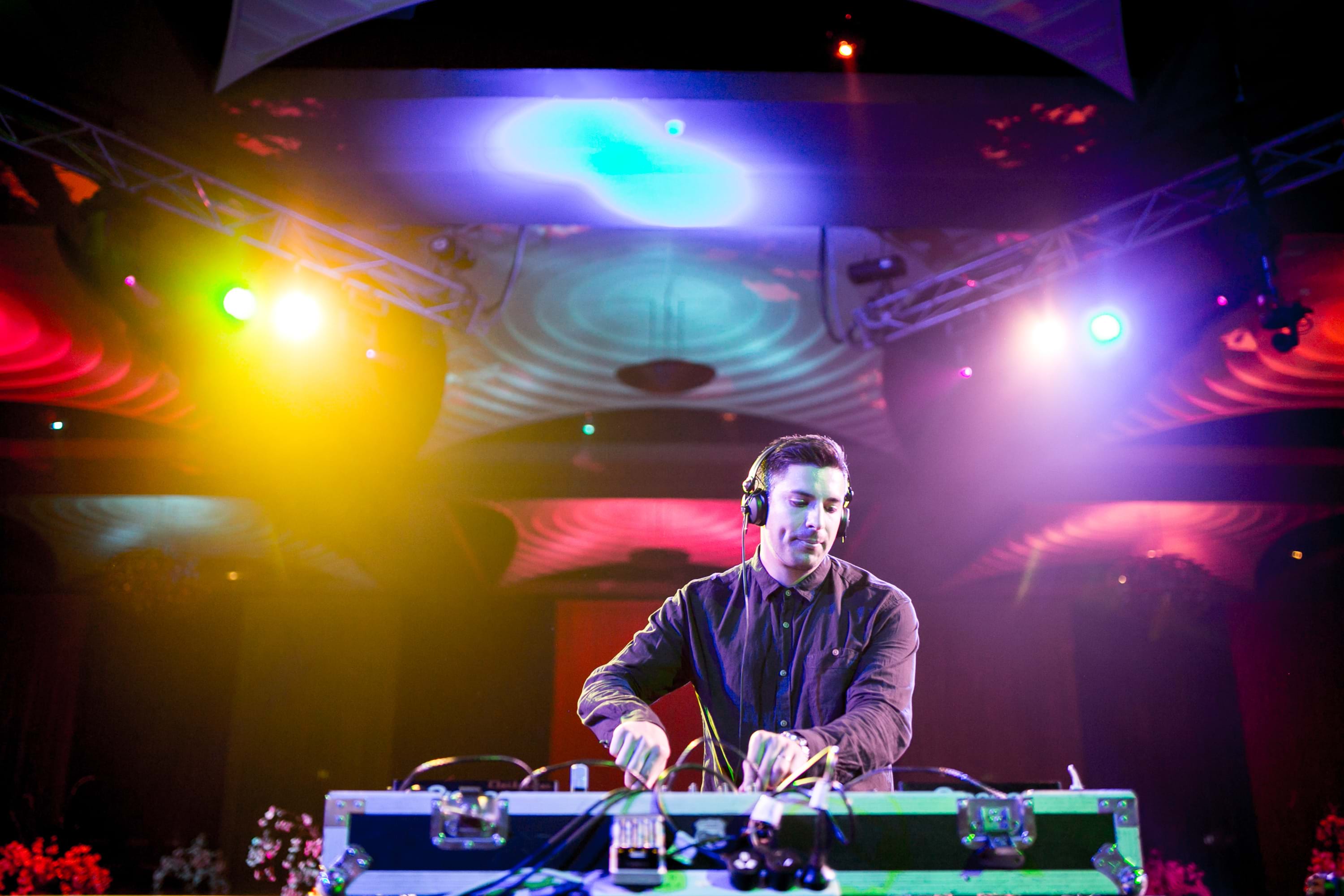 DJ Jesus Loyola on the decks at Red Ball Melbourne 2014 for Fight Cancer Foundation.
